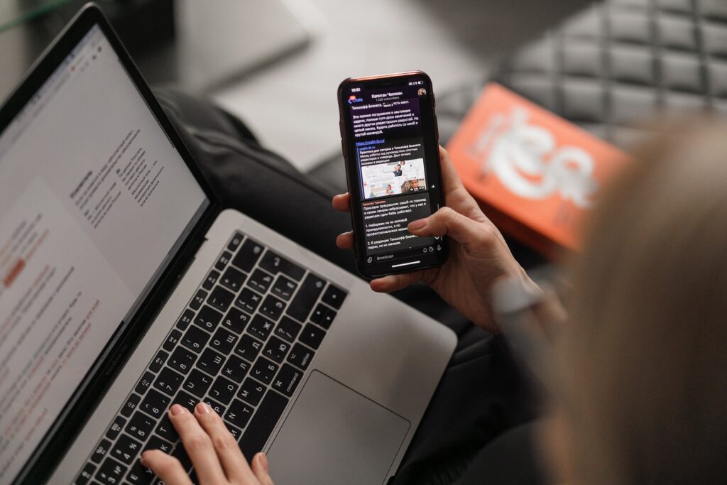 person reading email on mobile phone
